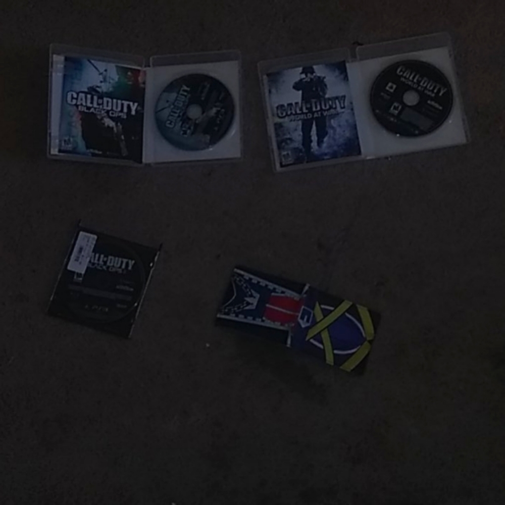 3 Ps3 games and a kingdom of hearts wallet